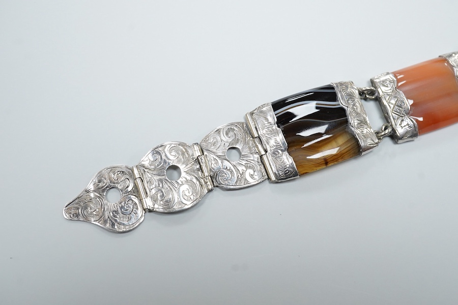 A Victorian Scottish engraved white metal and banded agate set bracelet, with buckle clasp, overall length 21.8cm.